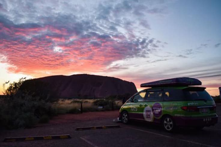 road trip itinerary adelaide to alice spring 2 jucy camper parked near uluru national park at sunrise