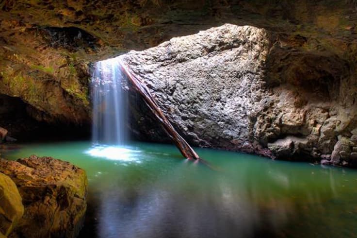 road trip itinerary brisbane to byron bay 2 Natural Bridge waterfall and pool
