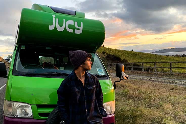 Sunset behind JUCY campervan in Taupo Sunset behind JUCY campervan in Taupo